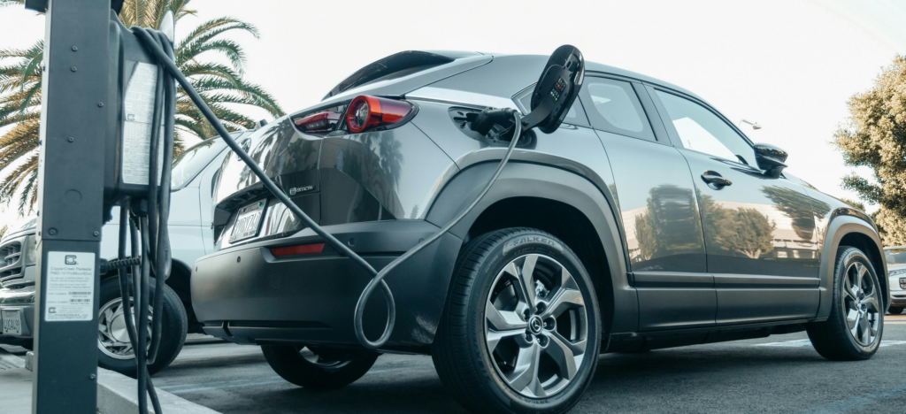 electric vehicle charging at station